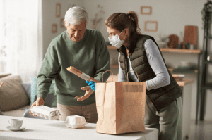 Volunteer delivering groceries, Pemi-Baker Hospice & Home Health, Plymouth, NH